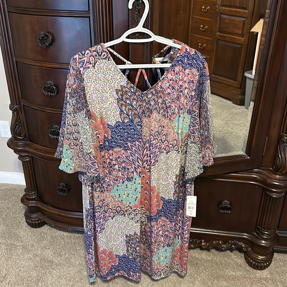 This is a soft boho midi dress with flutter sleeves.  Back has straps. - Picture 1 of 6